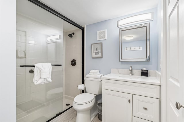 full bath featuring a stall shower, visible vents, vanity, and toilet