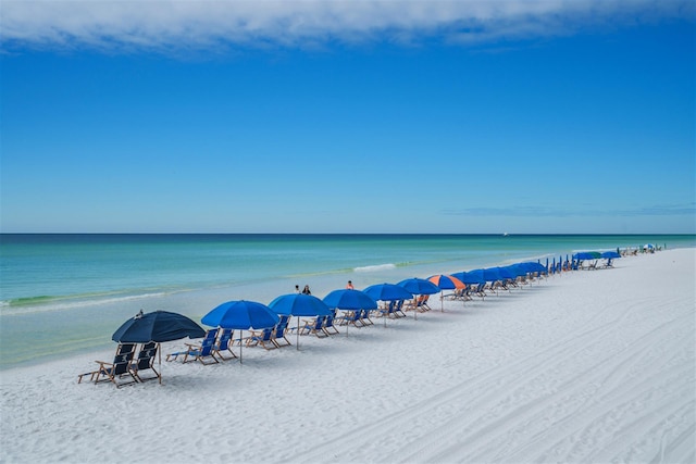 property view of water featuring a beach view