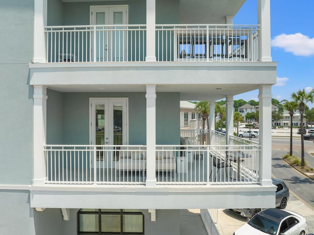 view of patio / terrace featuring french doors and a balcony