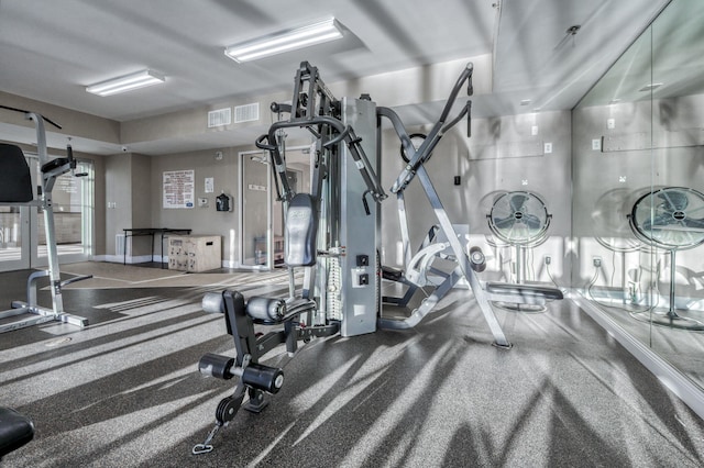 workout area featuring visible vents