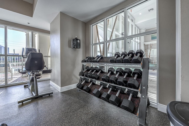 gym with visible vents and baseboards