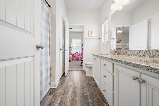 124 Conner Cir, Santa Rosa Beach, FL 32459 - full bath featuring toilet, wood finished floors, and vanity