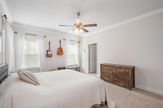 124 Conner Cir, Santa Rosa Beach, FL 32459 - bedroom with baseboards, ornamental molding, a ceiling fan, and light colored carpet