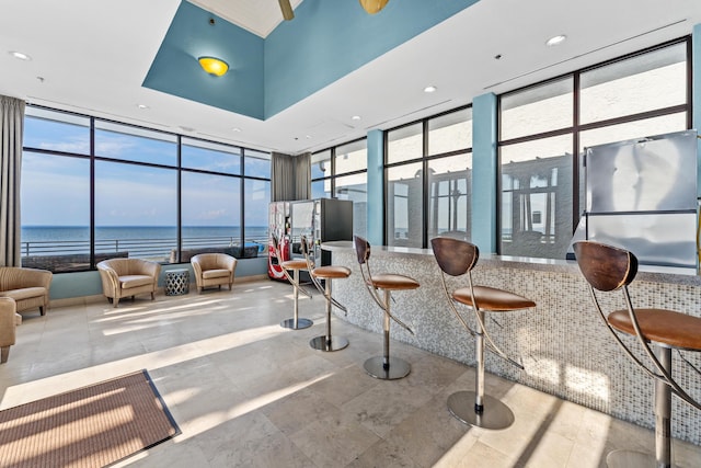 building lobby featuring a water view