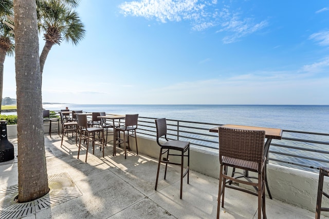 view of patio / terrace with a water view