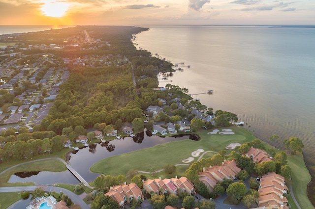 drone / aerial view featuring a residential view and a water view