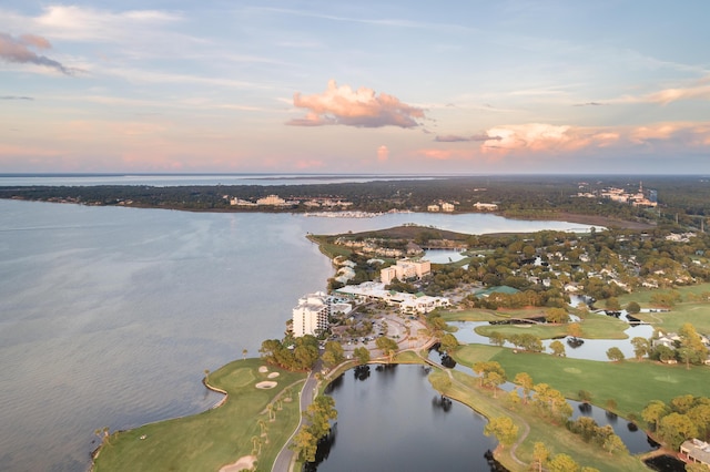 aerial view at dusk with a water view