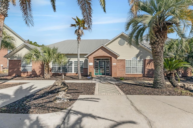 view of front of property with brick siding