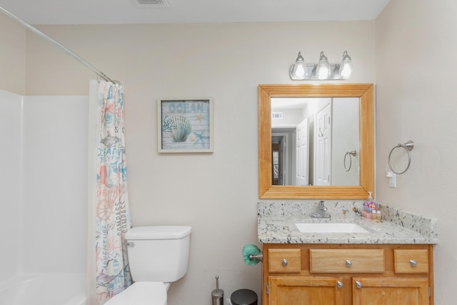 full bath with shower / bath combo, visible vents, vanity, and toilet