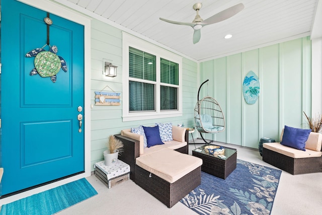 entrance to property with a porch and ceiling fan