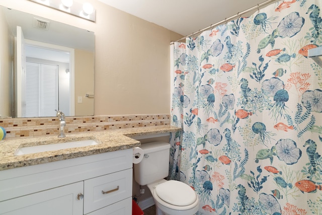 bathroom with visible vents, backsplash, toilet, vanity, and a shower with curtain