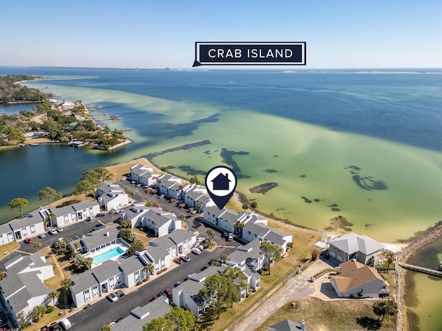 birds eye view of property featuring a water view and a residential view