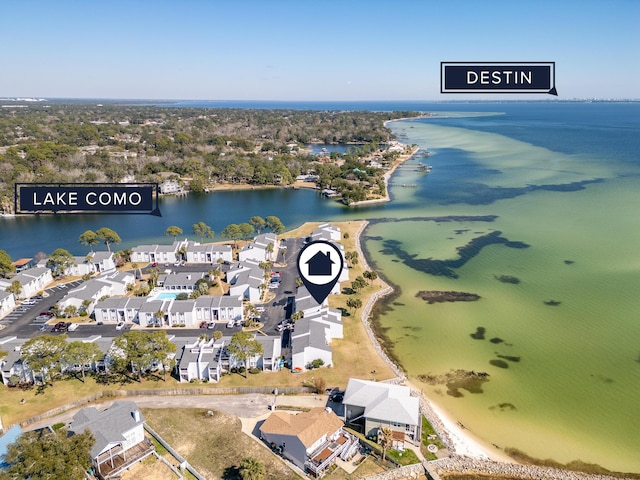 bird's eye view with a water view and a residential view