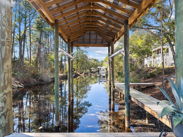 dock area featuring a water view