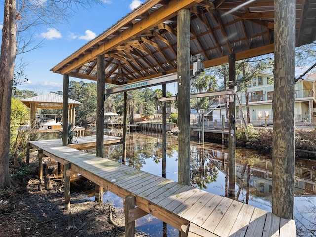 view of dock with a water view