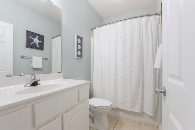 full bathroom with toilet, shower / bath combo, vanity, and tile patterned floors