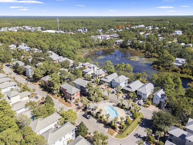 birds eye view of property with a residential view and a water view