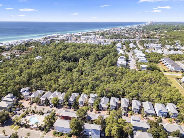 birds eye view of property with a water view and a residential view