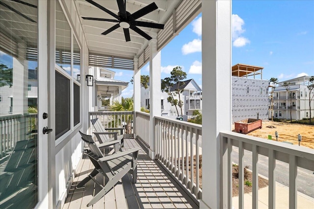 balcony featuring a ceiling fan