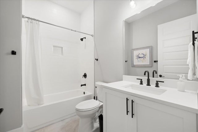 bathroom with shower / bath combo, vanity, and toilet