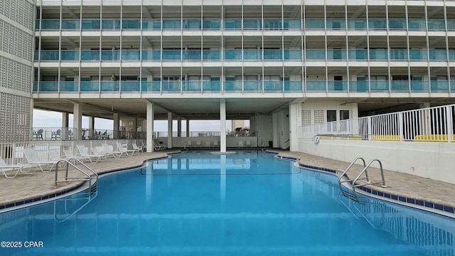 pool featuring fence