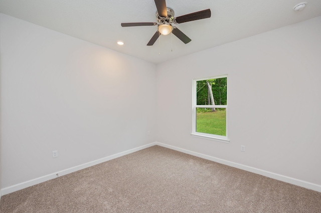 carpeted empty room with baseboards, recessed lighting, and ceiling fan