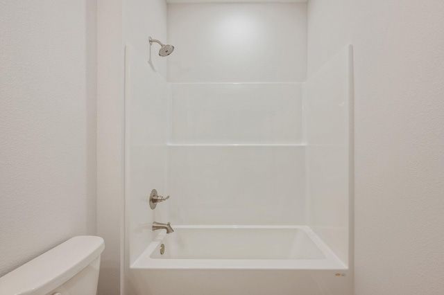 full bathroom featuring toilet and shower / bath combination