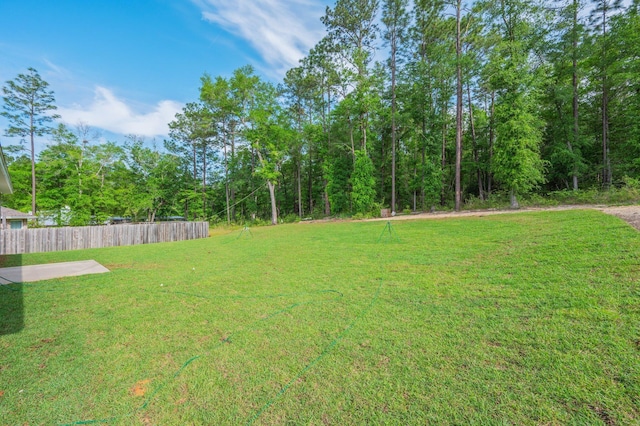 view of yard with fence