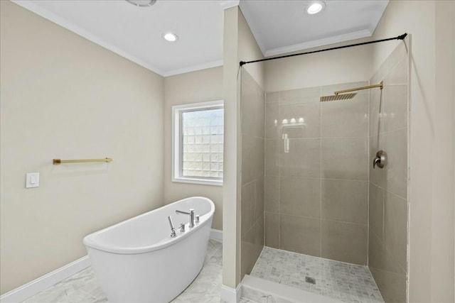 full bath with baseboards, a freestanding bath, marble finish floor, a shower stall, and crown molding