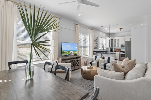 living room with recessed lighting and ceiling fan