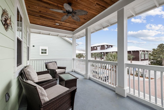 balcony featuring ceiling fan