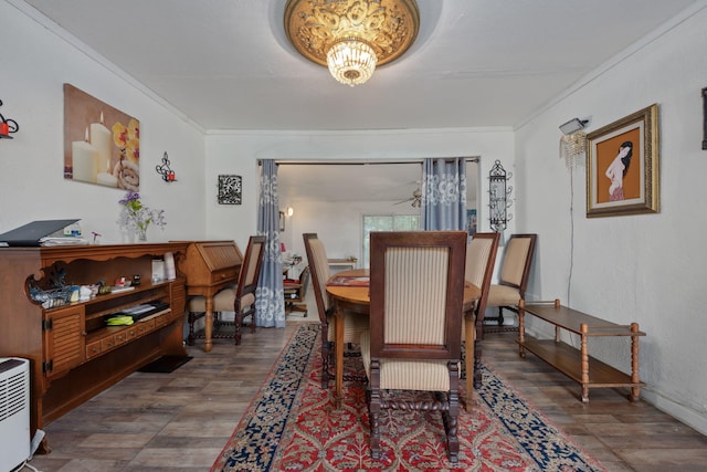 1005 Revere Dr, Pensacola, FL 32506 - dining area featuring ornamental molding and wood finished floors