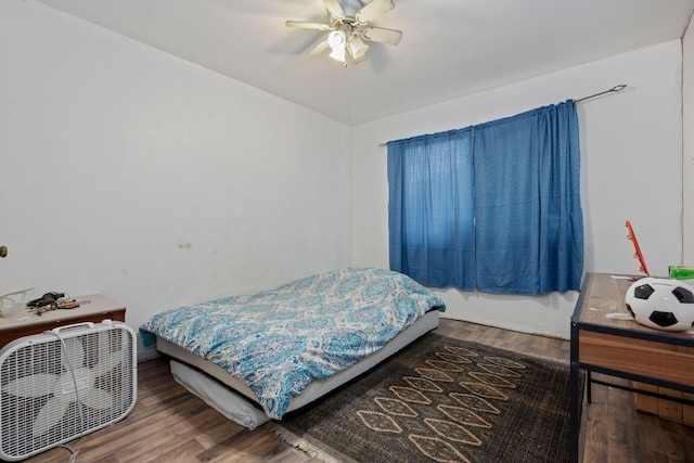 1005 Revere Dr, Pensacola, FL 32506 - bedroom with wood finished floors and ceiling fan