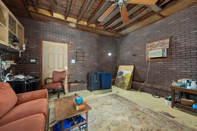 1005 Revere Dr, Pensacola, FL 32506 - interior space featuring concrete flooring, a ceiling fan, and brick wall