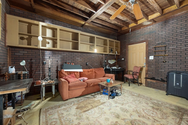 1005 Revere Dr, Pensacola, FL 32506 - living room with concrete flooring, beam ceiling, a ceiling fan, and brick wall