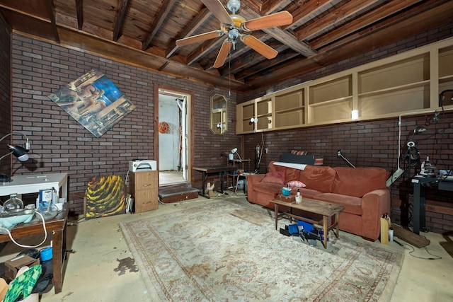 1005 Revere Dr, Pensacola, FL 32506 - living area with unfinished concrete floors, a ceiling fan, beam ceiling, and brick wall