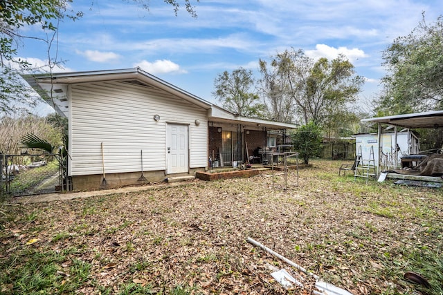 1005 Revere Dr, Pensacola, FL 32506 - rear view of property featuring fence