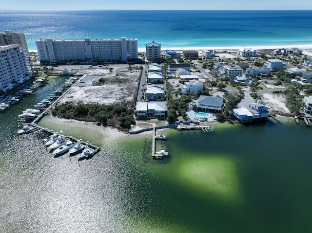 aerial view featuring a view of city and a water view