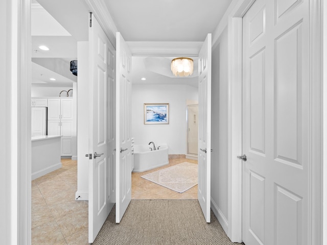 hall with baseboards, light tile patterned floors, and recessed lighting