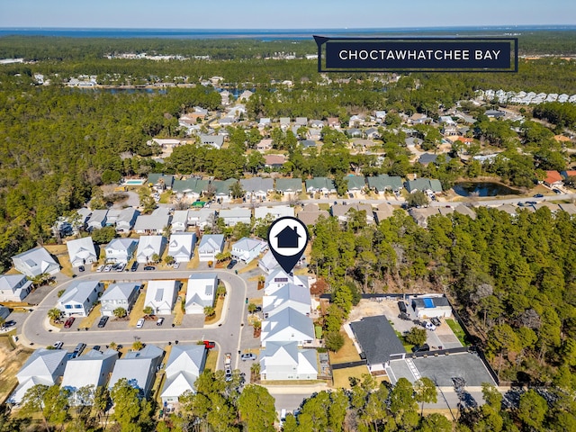 birds eye view of property with a residential view