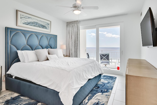 tiled bedroom featuring ceiling fan and access to outside