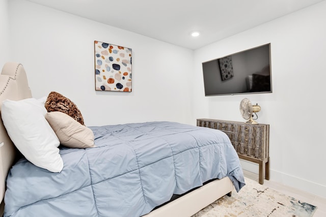 bedroom featuring baseboards and recessed lighting