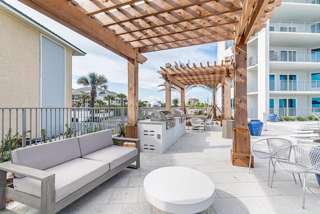 view of patio / terrace featuring outdoor lounge area, grilling area, area for grilling, and a pergola