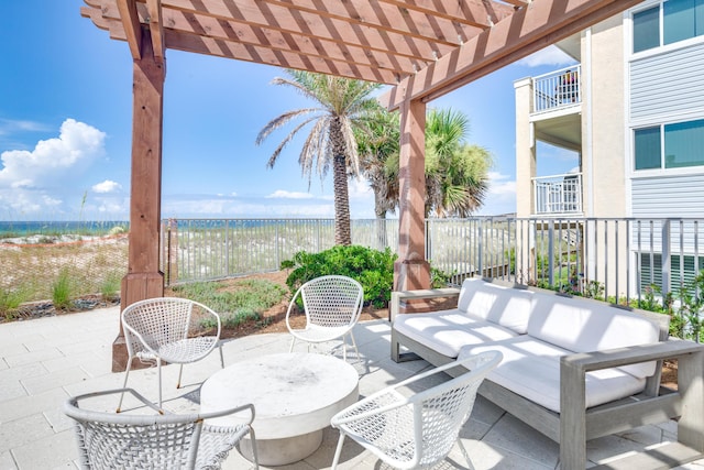 view of patio featuring a water view and a pergola