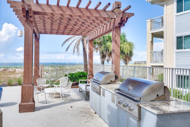 view of patio featuring outdoor dining space, grilling area, area for grilling, and a pergola