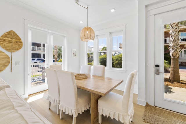 dining area featuring recessed lighting and light wood-style floors