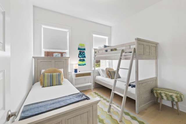 bedroom featuring light wood-style floors