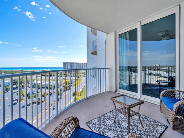 balcony featuring a water view