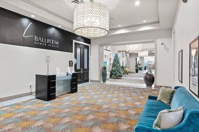 interior space featuring visible vents and an inviting chandelier