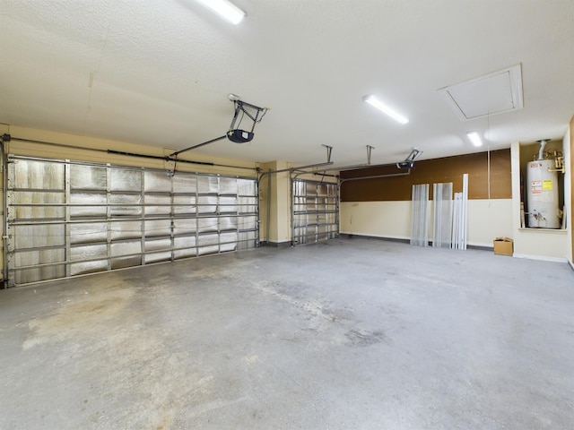 3098 Border Creek Dr, Crestview, FL 32539 - garage featuring water heater, baseboards, and a garage door opener
